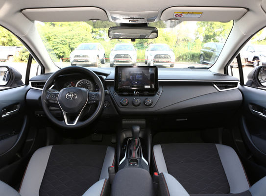 Véhicule électrique hybride abordable et Toyota Corolla